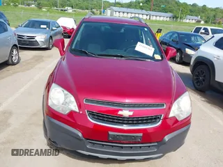 2014 Chevrolet Captiva Sport LS z VIN 3GNAL2EK8ES524280, wystawiony jako IAAI lot #42189302 z przebiegiem 101 142 mil mil oraz . Historia ofert i sprzedaży dostępna na DreamBid. Obrazek 12.