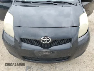 2010 Toyota Yaris z VIN JTDJT4K37A5290297, wystawiony jako Copart lot #56980175 z przebiegiem 459 391 mil mil oraz Czysty tytuł • Clean title. Historia ofert i sprzedaży dostępna na DreamBid. Obrazek 11.