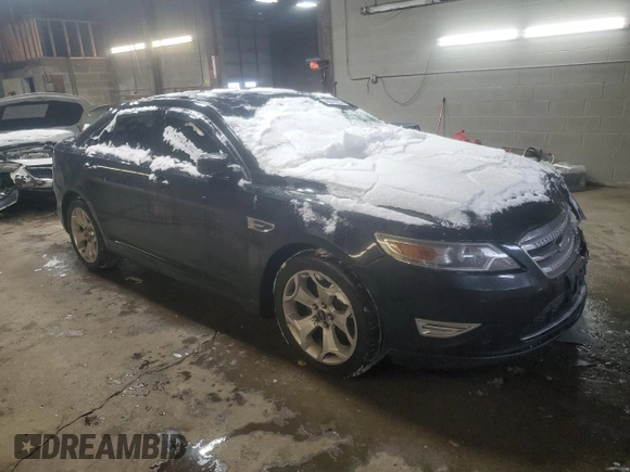 2012 Ford Taurus SHO with VIN 1FAHP2KT6CG138628, listed as a Copart auction lot 46219235 with 131,998 mi miles and Salvage title. Bid and sale history available at DreamBid. Image 4.