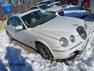 2005 Jaguar S-Type with VIN SAJWA01T75FN17656, listed as a IAAI auction lot 41282140 with 126,631 mi miles and . Bid and sale history available at DreamBid. Image 1.