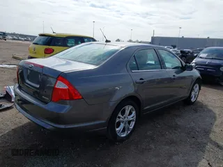2012 Ford Fusion SE z VIN 3FAHP0HG0CR436745, wystawiony jako IAAI lot #41598812 z przebiegiem 116 305 mil mil oraz . Historia ofert i sprzedaży dostępna na DreamBid. Obrazek 4.