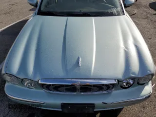 2005 Jaguar XJ with VIN SAJWA79C15SG47018, listed as a Copart auction lot 43087185 with 31,725 mi miles and Salvage Title. Bid and sale history available at carsss.com. Image 11.