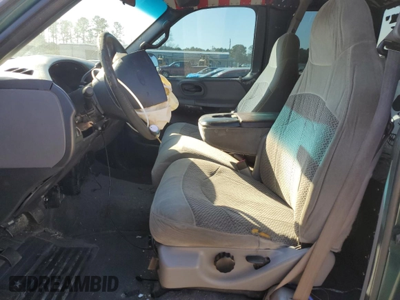 1999 Ford F-150 with VIN 1FTRX17W1XNC25527, listed as a Copart auction lot 48662525 with 150,544 mi miles and Salvage Title. Bid and sale history available at DreamBid. Image 7.