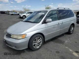 2001 Honda Odyssey EX z VIN 2HKRL18641H617838, wystawiony jako Copart lot #55169355 z przebiegiem 232 602 mil mil oraz Szkoda całkowita • Salvage title. Historia ofert i sprzedaży dostępna na DreamBid. Obrazek 1.