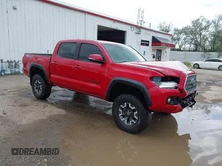 2019 Toyota Tacoma SR z VIN 5TFCZ5AN4KX182810, wystawiony jako IAAI lot #41601035 z przebiegiem 89 368 mil mil oraz . Historia ofert i sprzedaży dostępna na DreamBid. Obrazek 1.
