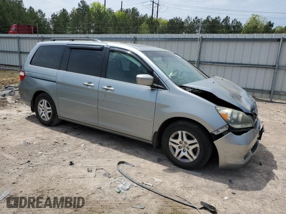 2007 Honda Odyssey EX-L with VIN 5FNRL38657B059033, listed as a Copart auction lot 54005495 with 212,674 mi miles and Salvage Title. Bid and sale history available at DreamBid. Image 4.