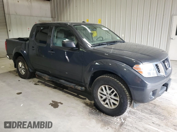 2015 Nissan Frontier Pro-4X with VIN 1N6AD0EV3FN732242, listed as a Copart auction lot 54837815 with 215,576 mi miles and Clean title. Bid and sale history available at DreamBid. Image 4.