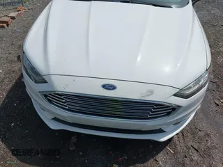 2017 Ford Fusion SE z VIN 3FA6P0HD7HR309432, wystawiony jako IAAI lot #42163947 z przebiegiem 201 575 mil mil oraz . Historia ofert i sprzedaży dostępna na DreamBid. Obrazek 6.