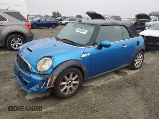 2011 MINI Convertible S with VIN WMWZP3C52BTX82943, listed as a Copart auction lot 81586044 with 145,543 mi miles and Salvage Title. Bid and sale history available at DreamBid. Image 1.