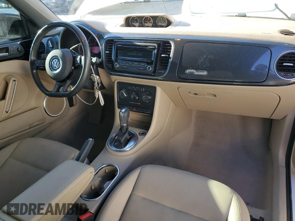 2013 Volkswagen Beetle with VIN 3VW7S7AT4DM827347, listed as a Copart auction lot 78689314 with 137,114 mi miles and Salvage Title. Bid and sale history available at DreamBid. Image 8.