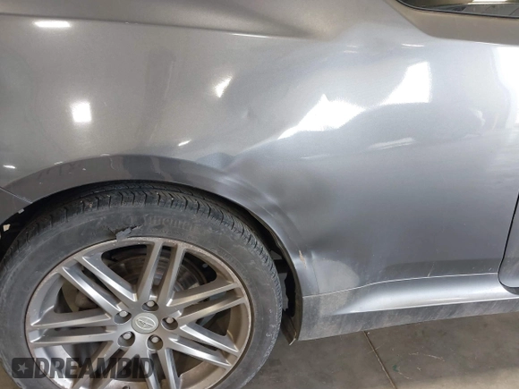 2011 Scion tC z VIN JTKJF5C79B3008777, wystawiony jako IAAI lot #41872563 z przebiegiem 149 715 mil mil oraz . Historia ofert i sprzedaży dostępna na DreamBid. Obrazek 12.