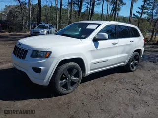 2015 Jeep Grand Cherokee Altitude with VIN 1C4RJFAG4FC924869, listed as a IAAI auction lot 41656444 with 112,786 mi miles. Bid and sale history available at carsss.com. Image 17.