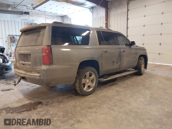 2019 Chevrolet Suburban Premier with VIN 1GNSKJKC1KR291629, listed as a IAAI auction lot 41565675 with 129,672 mi miles and . Bid and sale history available at DreamBid. Image 4.