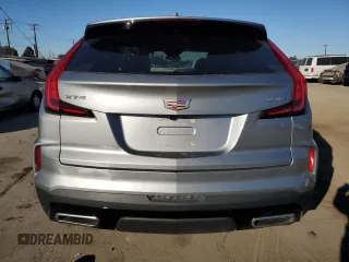 2024 Cadillac XT4 FWD Premium Luxury z VIN 1GYFZCR47RF126643, wystawiony jako Copart lot #80694964 z przebiegiem 24 583 mil mil oraz Czysty tytuł • Clean title. Historia ofert i sprzedaży dostępna na DreamBid. Obrazek 6.