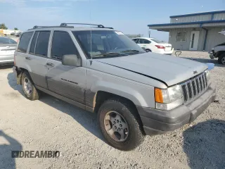 1998 Jeep Grand Cherokee Laredo with VIN 1J4GZ58S8WC301754, listed as a Copart auction lot 69698144 with 205,739 mi miles and Non Repairable. Bid and sale history available at carsss.com. Image 4.