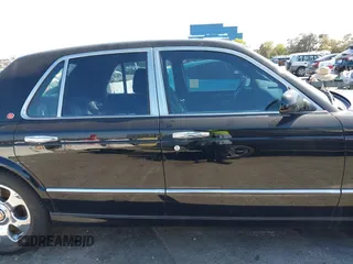 2001 Bentley Arnage with VIN SCBLC31E11CX06297, listed as a IAAI auction lot 41980275 with 63,510 mi miles and . Bid and sale history available at DreamBid. Image 13.