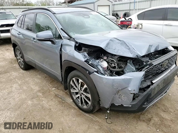 2023 Toyota Corolla Cross XLE with VIN 7MUDAABG1PV052040, listed as a Copart auction lot 51840315 with 43,228 mi miles and Salvage title. Bid and sale history available at DreamBid. Image 12.