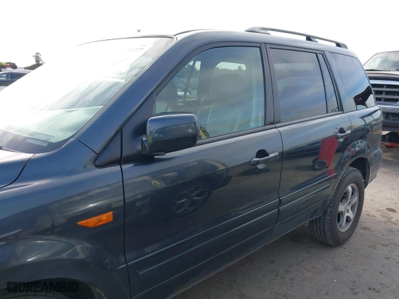 2006 Honda Pilot EX-L with VIN 2HKYF18536H538744, listed as a IAAI auction lot 42025277 with 203,012 mi miles. Bid and sale history available at carsss.com. Image 14.