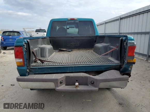 1997 Ford Ranger XLT with VIN 1FTCR14X0VPB40063, listed as a Copart auction lot 84930094 with 121,186 mi miles and Salvage Title. Bid and sale history available at DreamBid. Image 6.