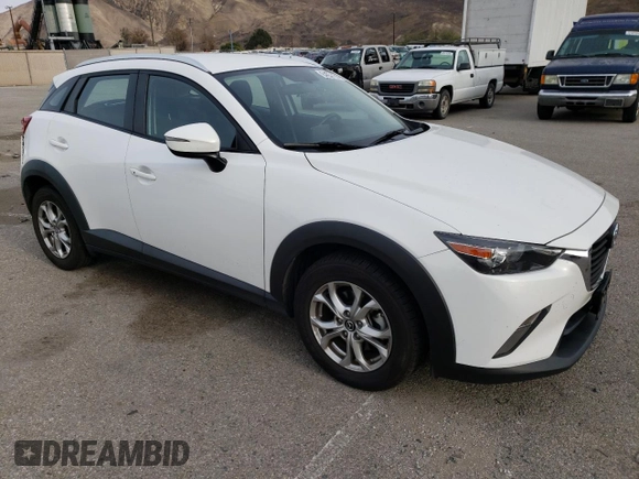 2016 Mazda CX-3 Touring with VIN JM1DKBC71G0123543, listed as a Copart auction lot 84657294 with 113,080 mi miles and Salvage Title. Bid and sale history available at carsss.com. Image 4.