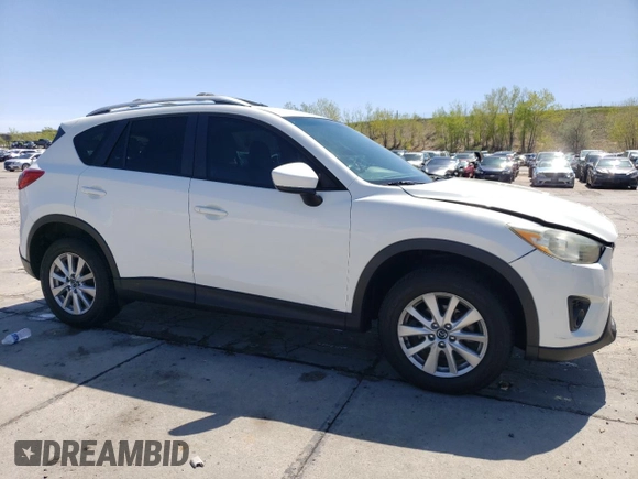2014 Mazda CX-5 Touring z VIN JM3KE4CYXE0393443, wystawiony jako Copart lot #54738705 z przebiegiem 68 220 mil mil oraz Szkody całkowita. Historia ofert i sprzedaży dostępna na DreamBid. Obrazek 4.