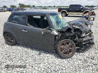 2011 MINI Hardtop S with VIN WMWSV3C55BTY20530, listed as a Copart auction lot 56016985 with Not Provided miles and Salvage Title. Bid and sale history available at DreamBid. Image 4.