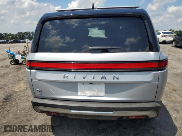 2024 Rivian R1S Adventure with VIN 7PDSGBBA1RN041672, listed as a Copart auction lot 61924974 with Not Provided miles and Salvage Title. Bid and sale history available at carsss.com. Image 6.