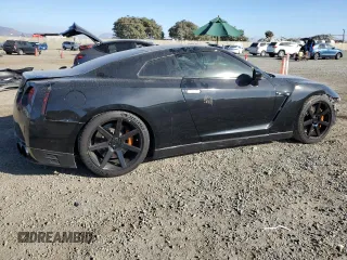 2015 Nissan GT-R Premium z VIN JN1AR5EFXFM280731, wystawiony jako Copart lot #77720934 z przebiegiem 96 483 mil mil oraz Szkoda całkowita • Salvage title. Historia ofert i sprzedaży dostępna na DreamBid. Obrazek 3.