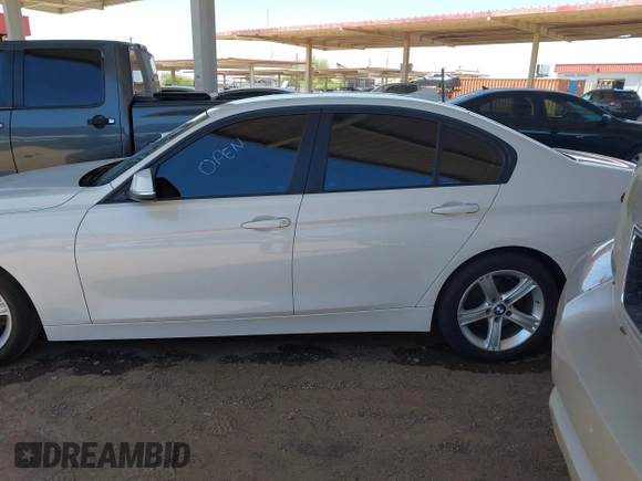 2014 BMW 3 Series 328i with VIN WBA3C1C52EK108503, listed as a IAAI auction lot 42258511 with 151,241 mi miles and . Bid and sale history available at DreamBid. Image 14.