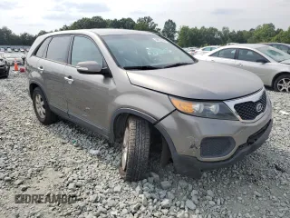 2013 Kia Sorento LX with VIN 5XYKT3A14DG386074, listed as a Copart auction lot 59879935 with 163,427 mi miles and Salvage title. Bid and sale history available at DreamBid. Image 4.