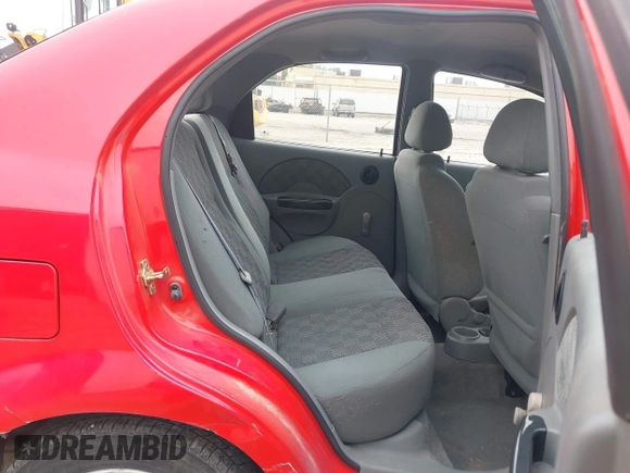 2005 Chevrolet Aveo LS with VIN KL1TD52675B496112, listed as a IAAI auction lot 42087412 with 63,176 mi miles and . Bid and sale history available at DreamBid. Image 8.