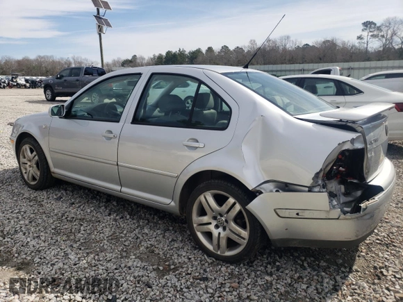 2004 Volkswagen Jetta GL z VIN 3VWRK69M94M102780, wystawiony jako Copart lot #45484585 z przebiegiem 202 009 mil mil oraz Nie do naprawy • Non repairable. Historia ofert i sprzedaży dostępna na DreamBid. Obrazek 2.