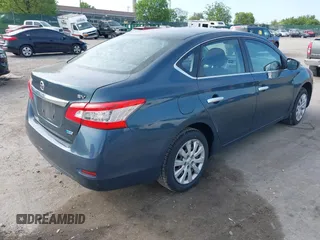 2014 Nissan Sentra S with VIN 3N1AB7AP3EY242459, listed as a IAAI auction lot 42174137 with 203,956 mi miles and . Bid and sale history available at DreamBid. Image 4.