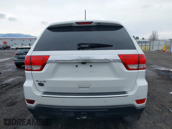 2013 Jeep Grand Cherokee Overland with VIN 1C4RJFCT4DC640553, listed as a IAAI auction lot 41311413 with 146,212 mi miles. Bid and sale history available at carsss.com. Image 17.