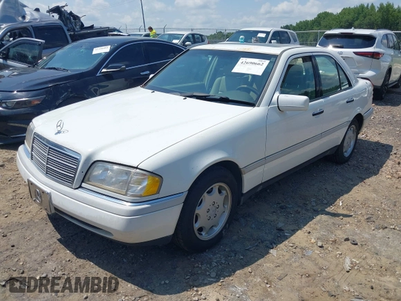 1997 Mercedes-Benz C with VIN WDBHA23E2VF504829, listed as a IAAI auction lot 42690662 with 266,074 mi miles and . Bid and sale history available at DreamBid. Image 2.