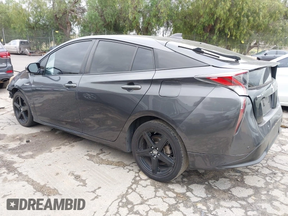 2016 Toyota Prius Four with VIN JTDKARFU8G3015083, listed as a IAAI auction lot 42191765 with 168,820 mi miles and . Bid and sale history available at DreamBid. Image 3.