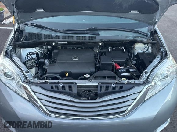 2013 Toyota Sienna XLE AAS with VIN 5TDYK3DC6DS398059, listed as a Copart auction lot 56074325 with 186,212 mi miles and Clean Title. Bid and sale history available at DreamBid. Image 7.