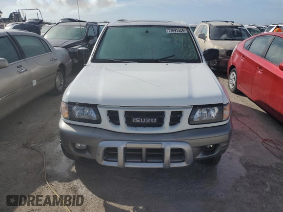 2001 Isuzu Rodeo z VIN 4S2CK57W614340766, wystawiony jako Copart lot #73891524 z przebiegiem 124 446 mil mil oraz Nie do naprawy. Historia ofert i sprzedaży dostępna na DreamBid. Obrazek 5.