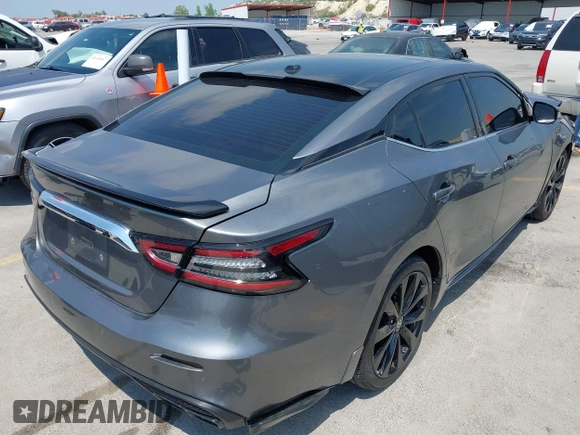 2020 Nissan Maxima SR with VIN 1N4AA6EVXLC383592, listed as a IAAI auction lot 42058071 with 103,014 mi miles and . Bid and sale history available at DreamBid. Image 4.