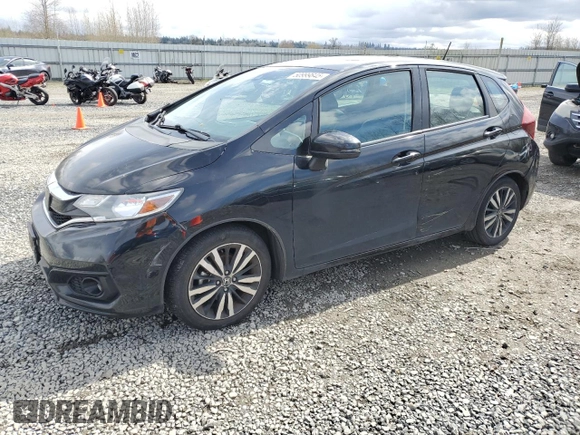 2018 Honda Fit EX-L with VIN 3HGGK5H99JM700706, listed as a Copart auction lot 50999845 with 74,985 mi miles and Salvage title. Bid and sale history available at DreamBid. Image 1.