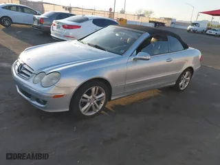 2006 Mercedes-Benz CLK-Class 3.5L with VIN WDBTK56H66F185452, listed as a IAAI auction lot 41979353 with 157,946 mi miles. Bid and sale history available at carsss.com. Image 2.