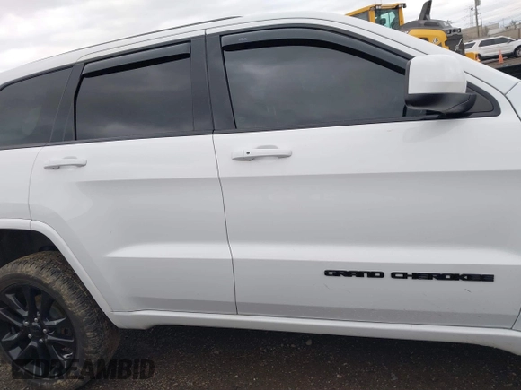 2018 Jeep Grand Cherokee Altitude with VIN 1C4RJFAG2JC284301, listed as a IAAI auction lot 41832657 with 97,160 mi miles and . Bid and sale history available at DreamBid. Image 13.