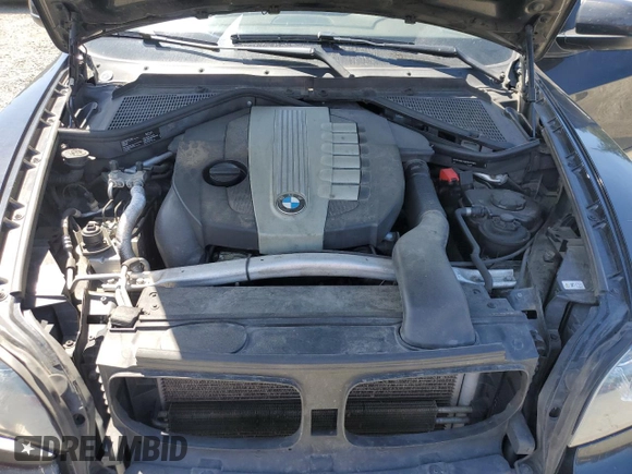 2012 BMW X5 35d z VIN 5UXZW0C59CL670242, wystawiony jako Copart lot #57638165 z przebiegiem 174 430 mil mil oraz Szkoda całkowita • Salvage title. Historia ofert i sprzedaży dostępna na DreamBid. Obrazek 12.