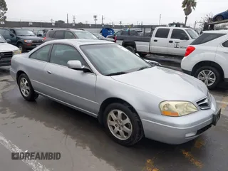 2001 Acura CL with VIN 19UYA42421A034963, listed as a IAAI auction lot 42091143 with 134,513 mi miles. Bid and sale history available at carsss.com. Image 1.