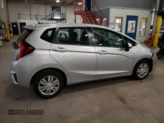 2015 Honda Fit LX с VIN 3HGGK5H56FM720996, выставлен на аукционе Copart как лот 57565945 с пробегом 90 222 миль миль и Списание • Salvage title. История ставок и продаж доступна на DreamBid. Изображение 3.