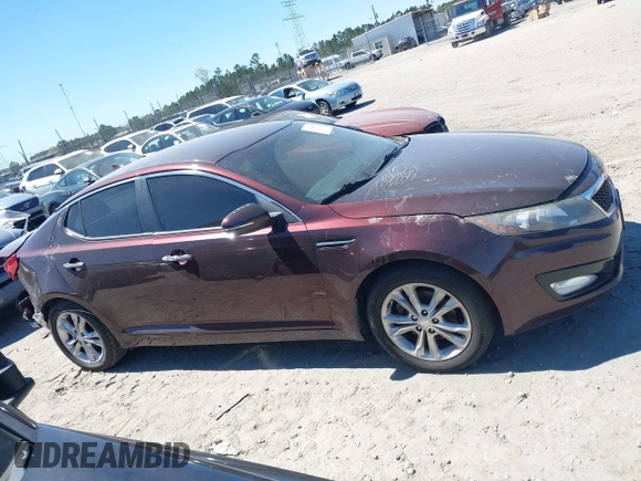 2012 Kia Optima EX with VIN 5XXGN4A73CG071036, listed as a IAAI auction lot 41849926 with 147,448 mi miles. Bid and sale history available at carsss.com. Image 13.
