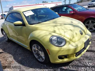 2012 Volkswagen Beetle 2.5L PZEV with VIN 3VWJP7AT4CM603419, listed as a IAAI auction lot 41736444 with 111,647 mi miles. Bid and sale history available at carsss.com. Image 1.