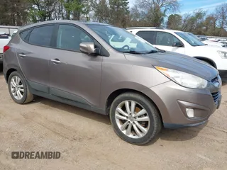2013 Hyundai Tucson GLS with VIN KM8JU3AC6DU638931, listed as a IAAI auction lot 41743291 with 226,836 mi miles. Bid and sale history available at carsss.com. Image 1.