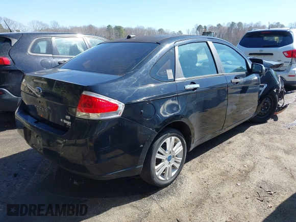 2008 Ford Focus SE with VIN 1FAHP35N88W218397, listed as a IAAI auction lot 41758730 with 192,732 mi miles. Bid and sale history available at carsss.com. Image 4.