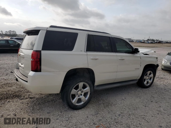 2015 Chevrolet Tahoe LT with VIN 1GNSCBKC9FR220574, listed as a Copart auction lot 54788555 with 244,491 mi miles and Salvage title. Bid and sale history available at DreamBid. Image 3.